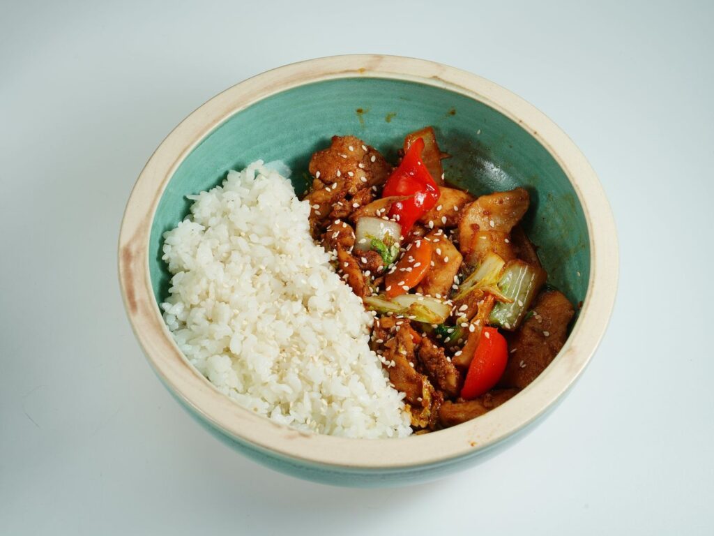 chicken rice meal prep bowl with frozen vegetables
